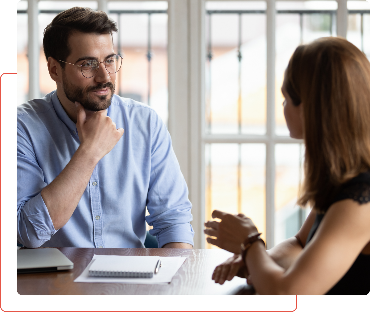 Group 14 A man and woman are sitting at a table